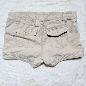 So Wear It Declare It Mini Beige Shorts